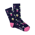 A pair of navy crew socks with a fun cocktail design. The socks feature pink and green illustrations of wine glasses, martinis, and other mixed drinks.