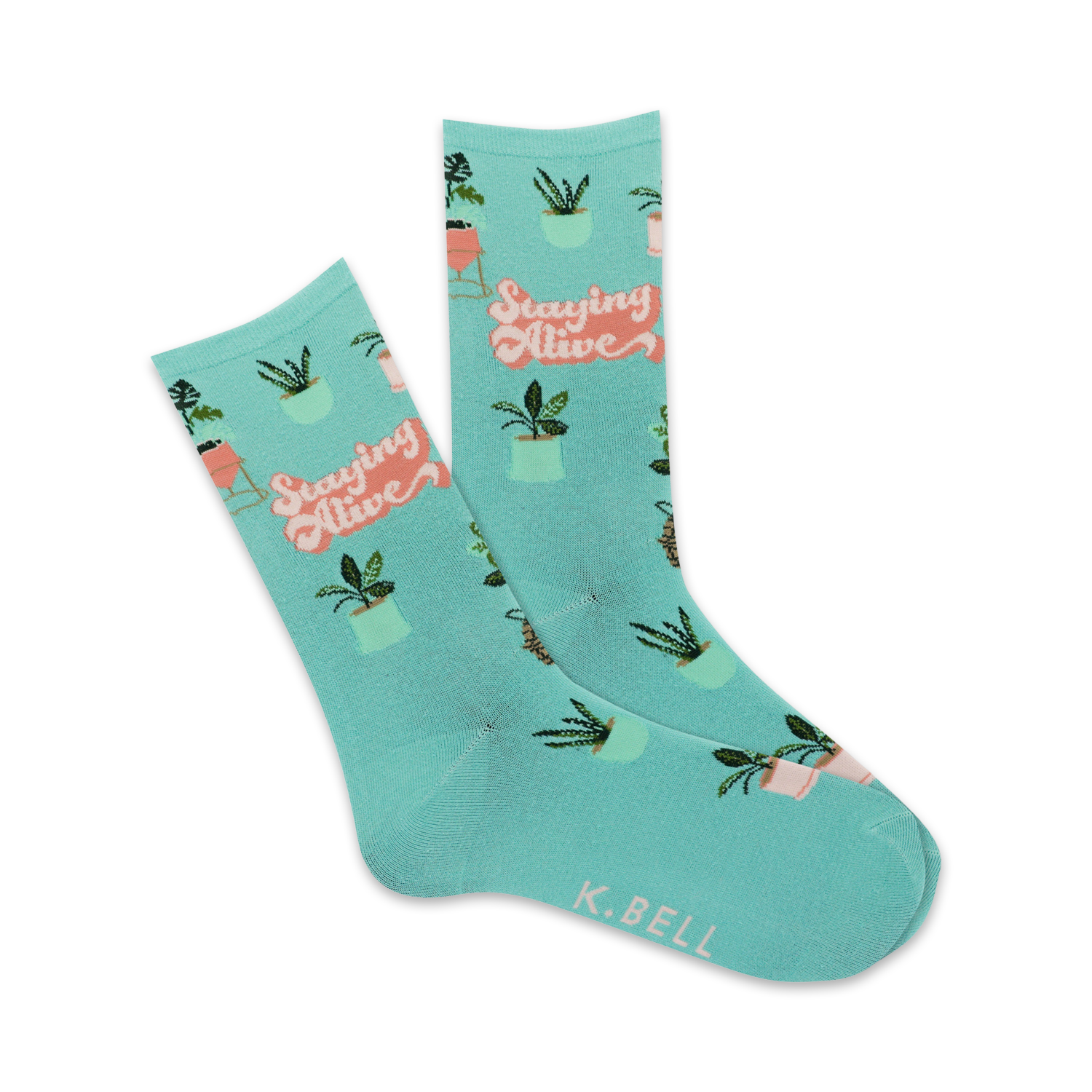 A pair of teal crew socks with a repeating pattern of potted plants and the phrase 'Staying Alive' in a retro font.