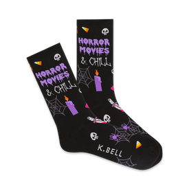 women's black crew socks with purple pattern of cobwebs, skulls, candles, and the words 'horror movies & chill'.   