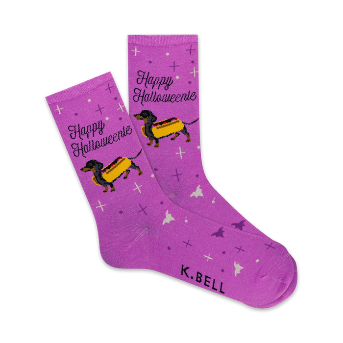 purple crew socks with all-over pattern of dachshunds in hotdog costumes, bats, and plus signs.   }}