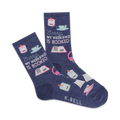 A pair of navy blue crew socks with illustrations of books, candles, teacups, and headphones. The text 'Sorry, my weekend is booked' is prominently displayed.