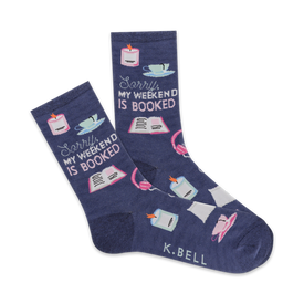  blue crew socks for women feature pink text and images of books, lit candles, tea cups, and headphones; "sorry my weekend is booked".  