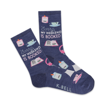  blue crew socks for women feature pink text and images of books, lit candles, tea cups, and headphones; "sorry my weekend is booked".  