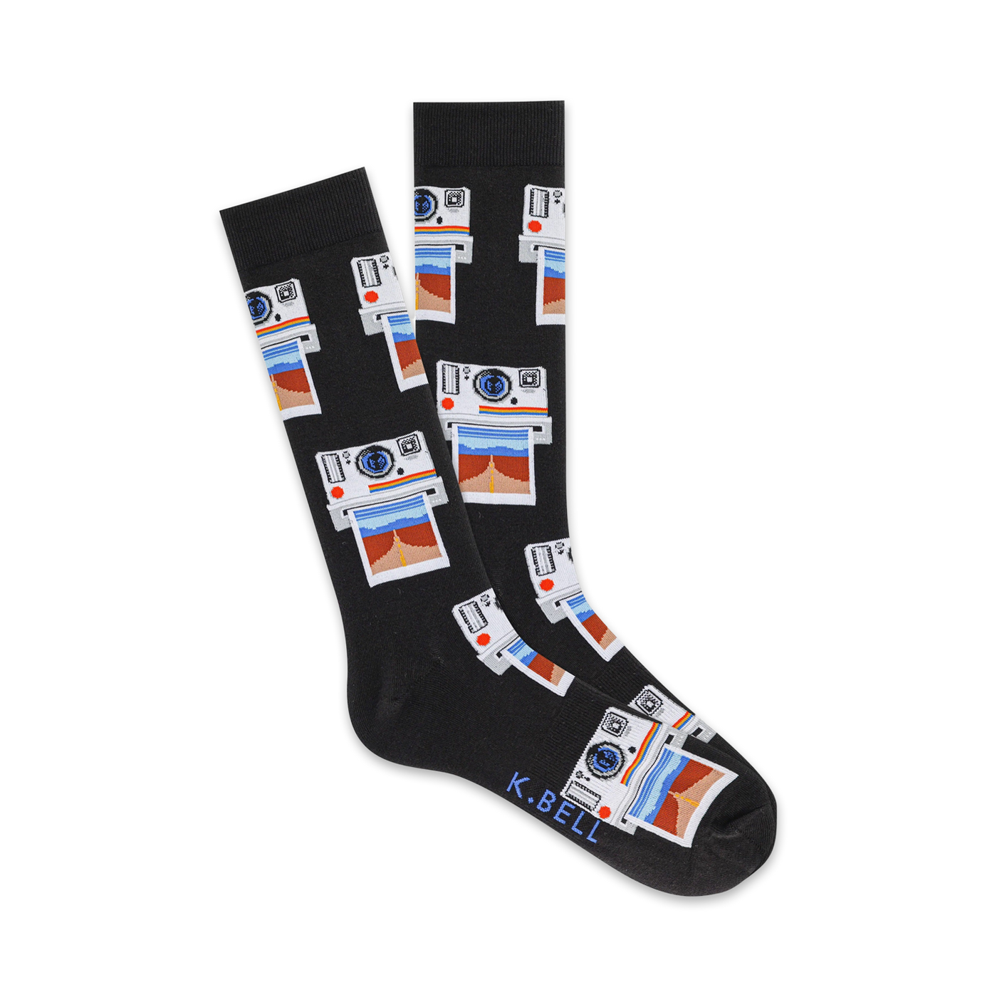Pair of black crew socks with a repeating pattern of vintage cameras and photos in red, blue, and white. The brand name K.BELL is on the sole.