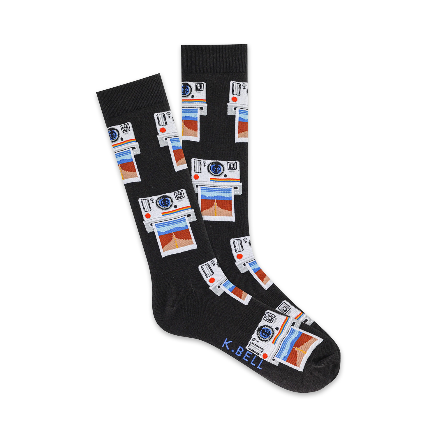 Pair of black crew socks with a repeating pattern of vintage cameras and photos in red, blue, and white. The brand name K.BELL is on the sole.