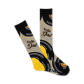 A pair of crew socks with a vinyl record design in black, yellow, and grey.  The words 'Rockin' Dad' are written on the socks.