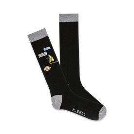 black crew socks with gray toes, heels, and cuffs featuring a sassy monkey holding a banana and a cell phone with text bubble saying "monkey business?".  