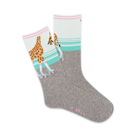 alt text: gray socks with white toe, light blue heel, and light blue and white striped cuff. pattern of giraffes wearing pink roller skates decorates the light blue area.  