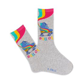 crew socks with blue roller skates with yellow wheels and pink laces. the word "roll" is written on the left sock and the word "on" is written on the right sock. made for women.  