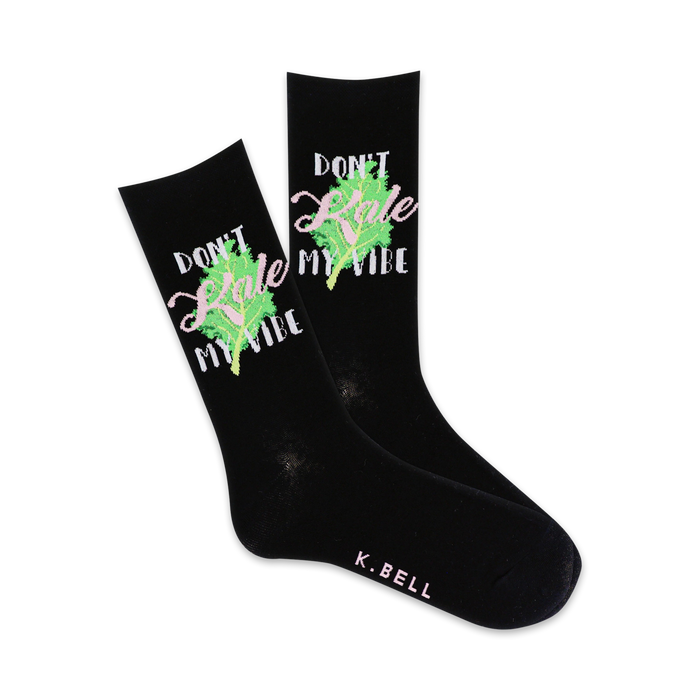 black crew socks with green and pink lettering that says â€œdon't kale my vibe.â€   }}
