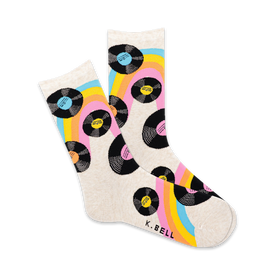 womens crew socks feature a colorful rainbow pattern of black vinyl records. rock your favorite tunes and embrace the fun!   