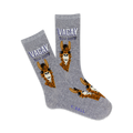 Pair of grey crew socks with brown llama illustrations and the text 'Vacay You Say?' in purple. Fun and quirky design.