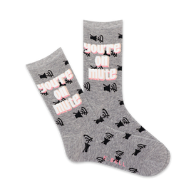 gray "you're on mute" crew socks for women with pink & black lettering.  
