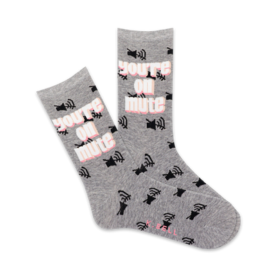 gray "you're on mute" crew socks for women with pink & black lettering.  