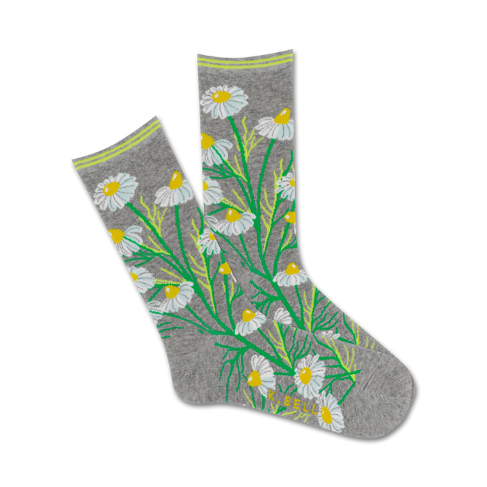 gray crew sock with white daisies featuring yellow centers, green stems, and leaves in random pattern.    }}
