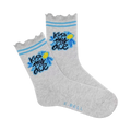 A pair of grey crew socks with a blue daisy and 'Kiss My Ace' written on them.  Light blue stripes at the top. 