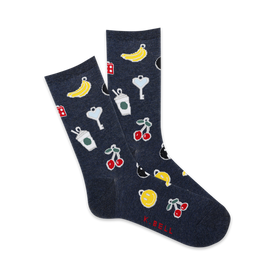 women's crew socks feature dark blue background covered with repeating pattern of cherries, bananas, black cats, keys, coffee cups and smiley faces.  