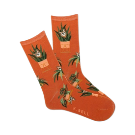 crew-length orange socks for women with a fun pattern of potted plants and gray and white cats peeking out.;  