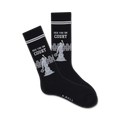 A pair of black crew socks with white stripes at the top.  The socks feature a grey tennis statue design and the words 'See You In Court'.