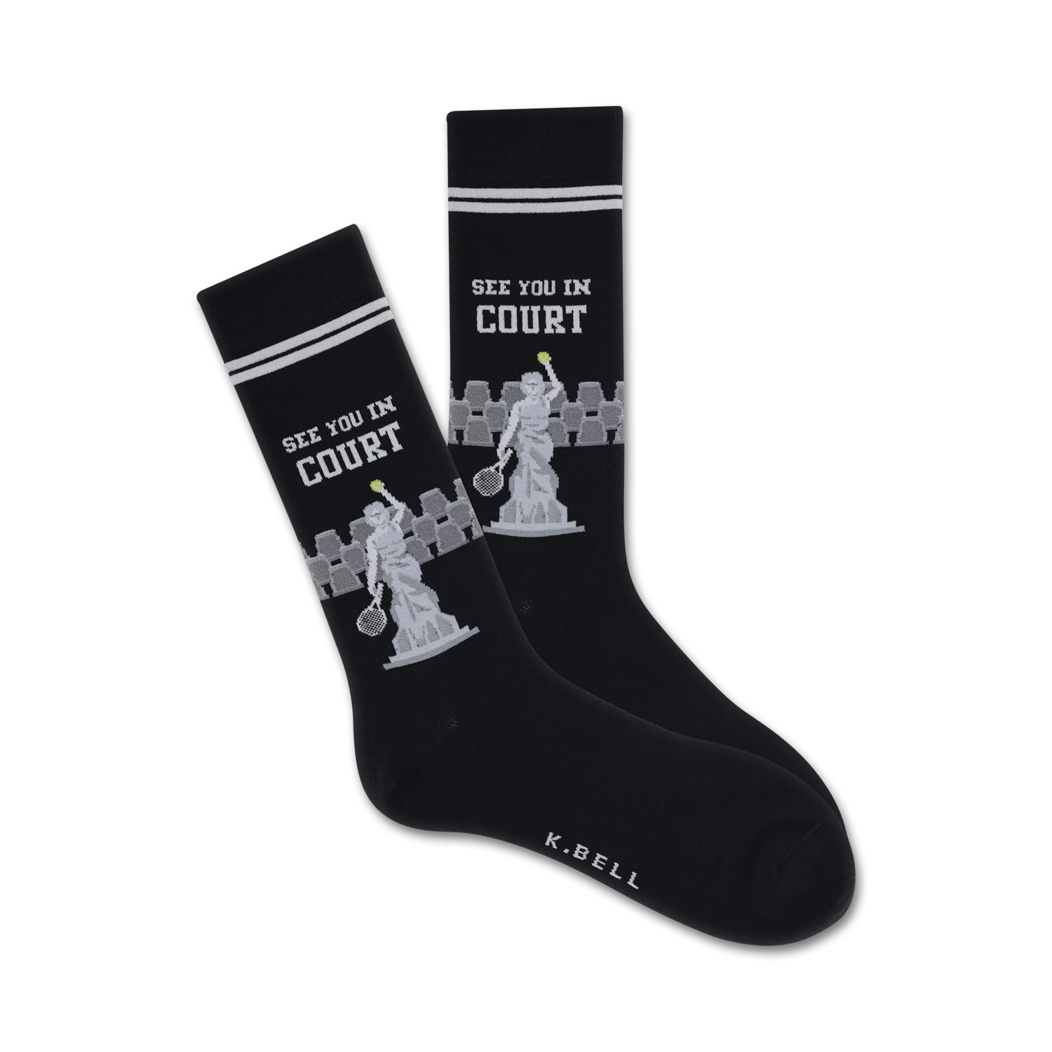 A pair of black crew socks with white stripes at the top.  The socks feature a grey tennis statue design and the words 'See You In Court'.