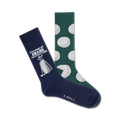 Two crew socks; one navy blue with golf clubs and text, one green with a repeating golf ball pattern.