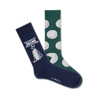 Two crew socks; one navy blue with golf clubs and text, one green with a repeating golf ball pattern.