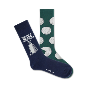Two crew socks; one navy blue with golf clubs and text, one green with a repeating golf ball pattern.