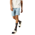 Model wearing the Tropical Floral socks with white slides and light blue shorts. [lf]