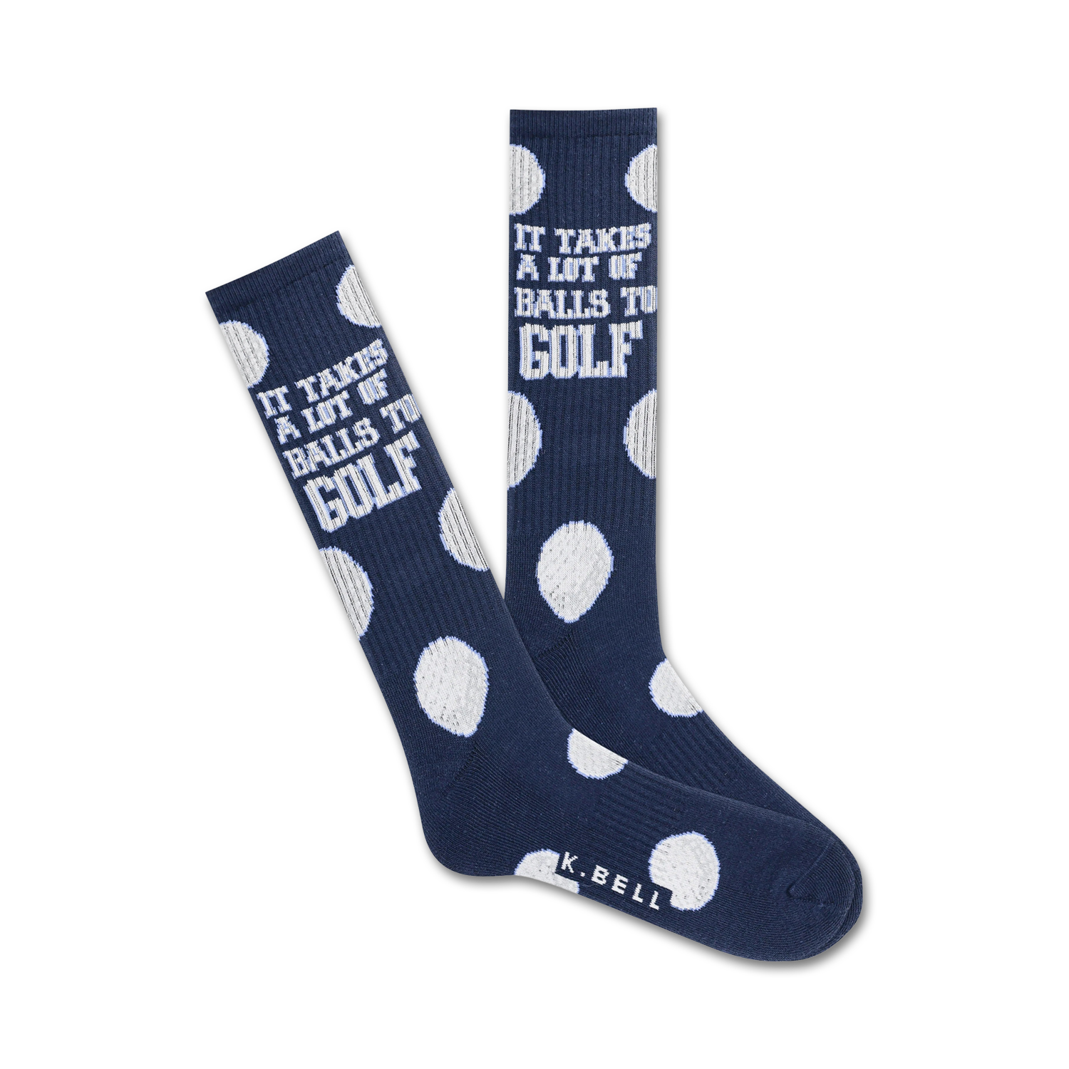 Pair of navy blue crew socks with white golf ball polka dots and the text 'It takes a lot of balls to golf!'