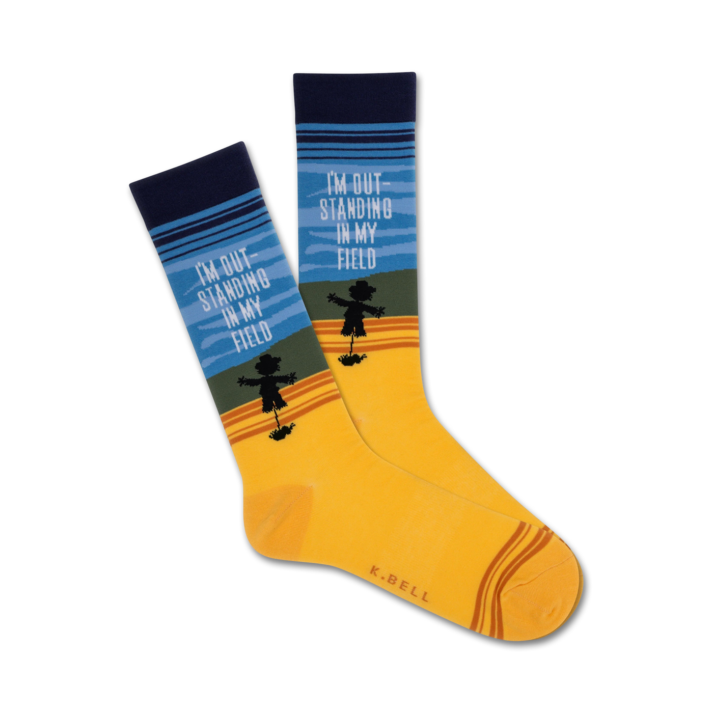 Crew socks in yellow, blue, and green stripes.  A scarecrow silhouette and the text 'I'm Out Standing In My Field' are featured.