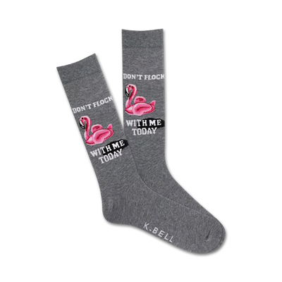 gray crew socks with a pattern of pink flamingos wearing sunglasses and "don't flock with me today" text bubble.  