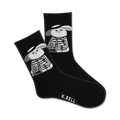 Pair of black crew socks with a graphic design of a white cat wearing a hat and striped outfit. The cat holds a small bag.