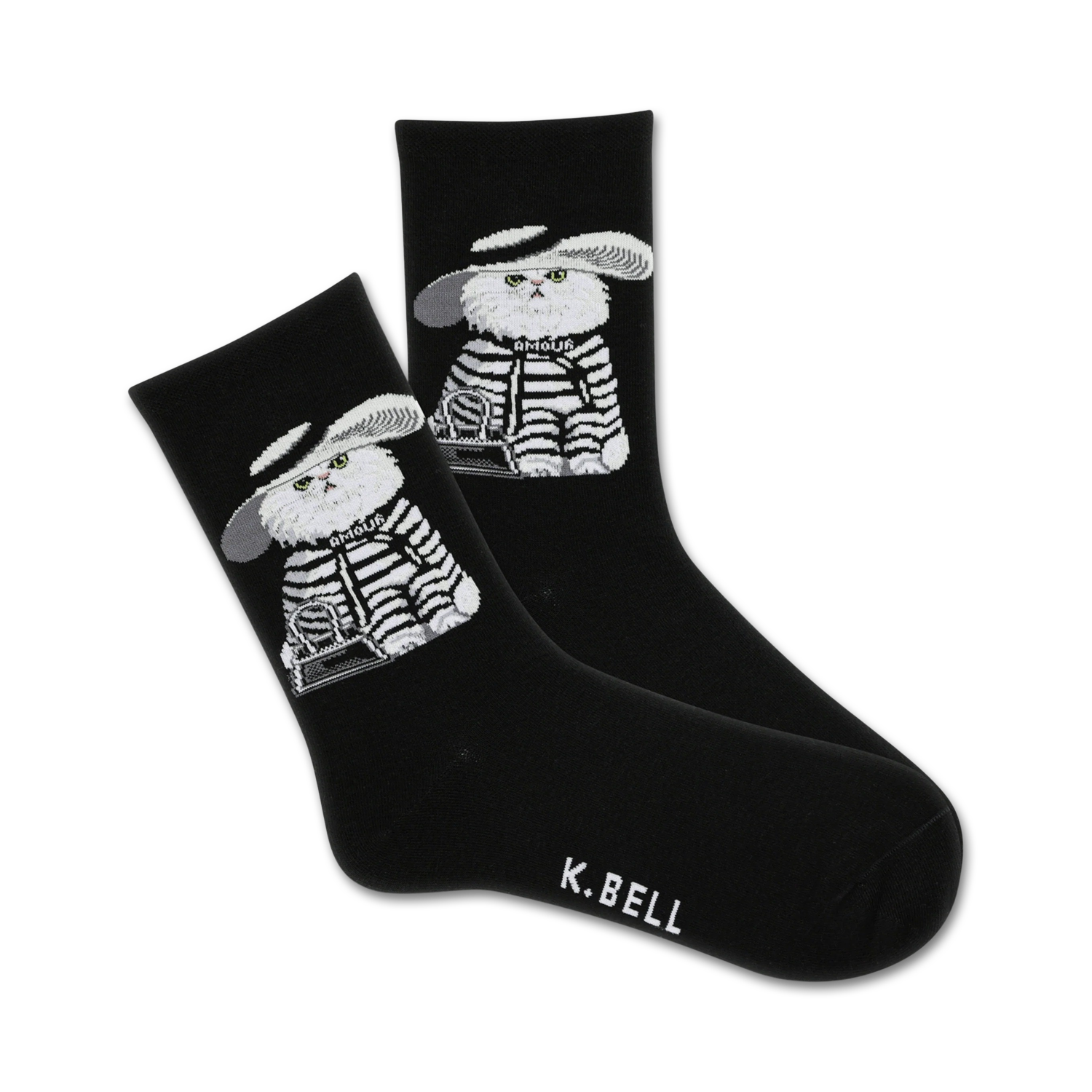 Pair of black crew socks with a graphic design of a white cat wearing a hat and striped outfit. The cat holds a small bag.