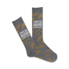 mens cheese board certified gray crew socks with an all-over orange pattern of cheeses and white lettering on legs.  