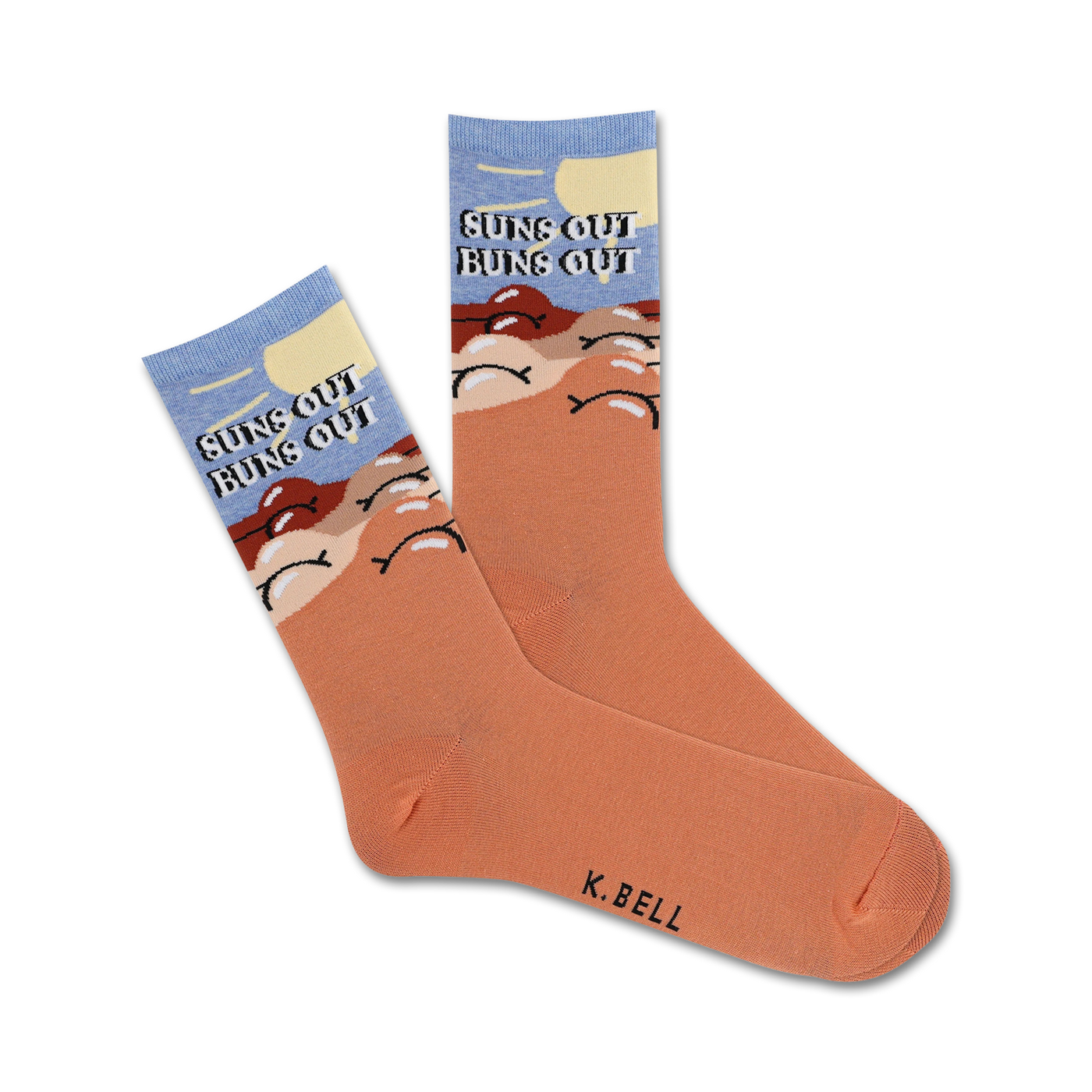 Pair of peach crew socks with a light blue sky, sun, and buns design.  Text reads 'Suns Out Buns Out'.