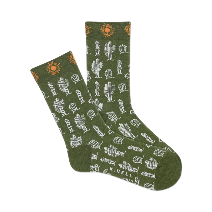 green crew socks with a pattern of white cacti and orange suns for women.   }}