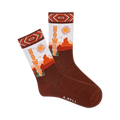 Pair of brown crew socks with an orange and white Southwestern design.  The socks say 'Howdy' and feature a desert landscape with a sun.