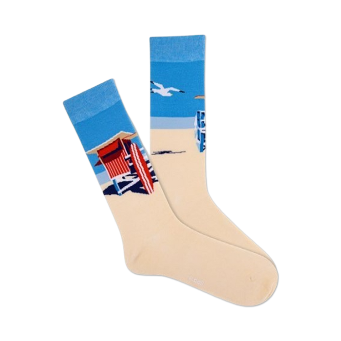 mens crew socks with white and blue background, red and white beach hut pattern, blue seagulls and green palm trees.   }}