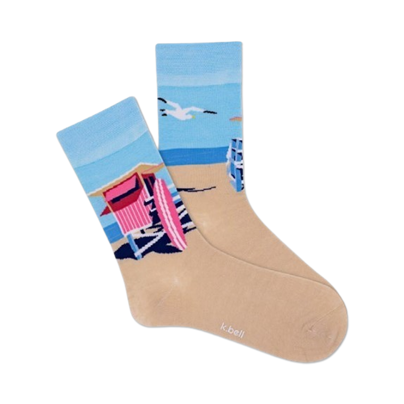 Pair of crew socks showcasing a beach scene with a pink lifeguard hut, ocean, and sand.  Socks are light beige with blue and pink design elements.