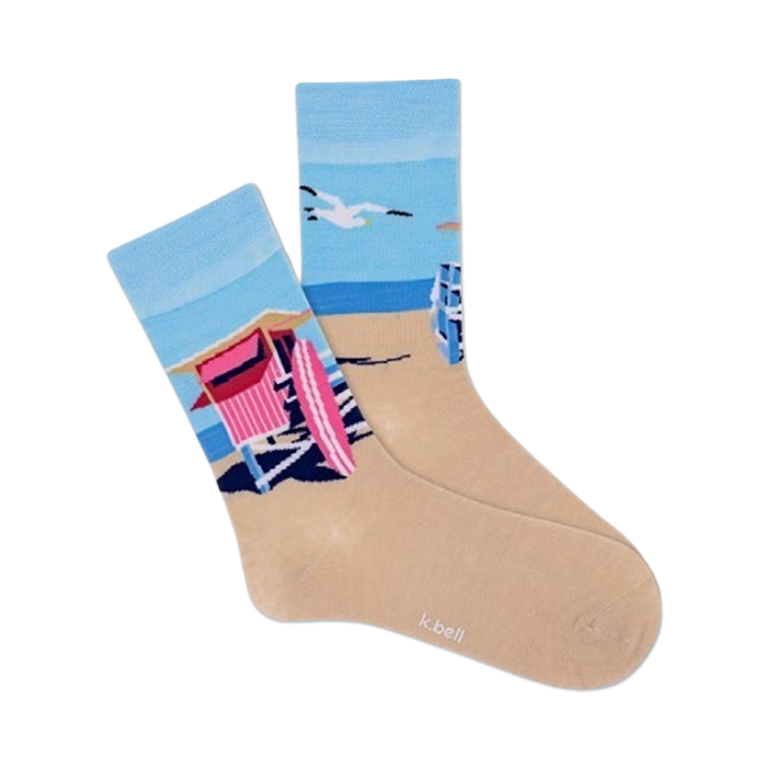 blue, tan, and pink women's crew socks with a pattern of beach huts, palm trees, and seagulls.   }}