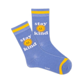 A pair of blue crew socks with a yellow sun and 'Stay Kind' text. Yellow cuffs add a pop of color.  A feel-good message for everyday wear!