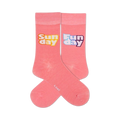Pair of pastel pink crew socks with 'Sunday' and 'Funday' playfully printed on each sock.