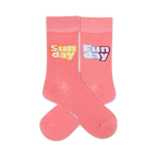 Pair of pastel pink crew socks with 'Sunday' and 'Funday' playfully printed on each sock.