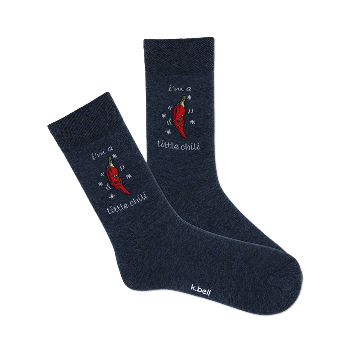 front view of two dark blue crew socks with red chili peppers and the text 