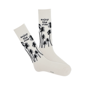 front view of white socks with black palm trees and "enjoy the ride" text.