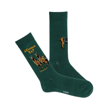 front view of a pair of green socks with llamas and the spanish phrase, "como te?"