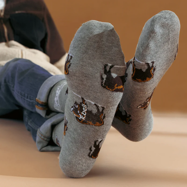 [lf] Lifestyle photo showcasing the Winter Bison socks on a model's feet, emphasizing comfort and style.
