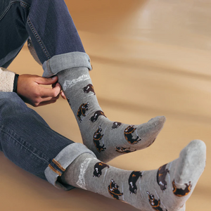Close-up shot of a person wearing the Winter Bison socks. The image highlights the detailed design and soft fabric.