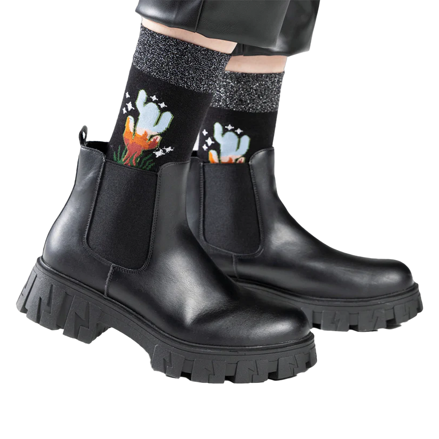 Lifestyle shot showing the socks worn with black ankle boots.