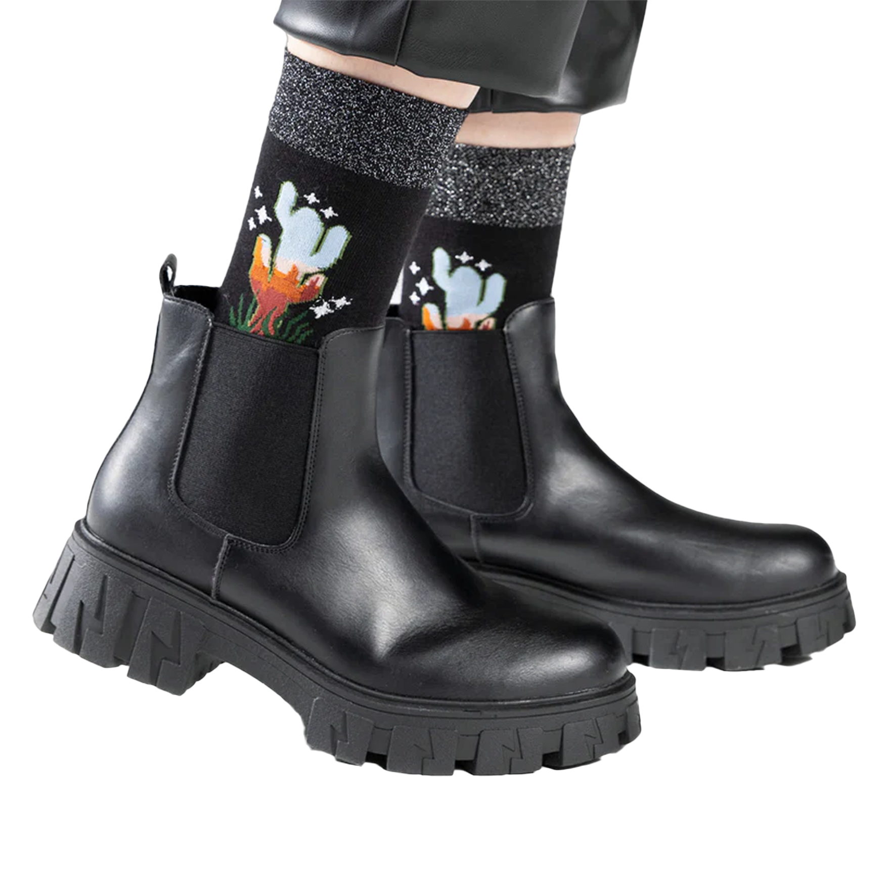 Lifestyle shot showing the socks worn with black ankle boots.